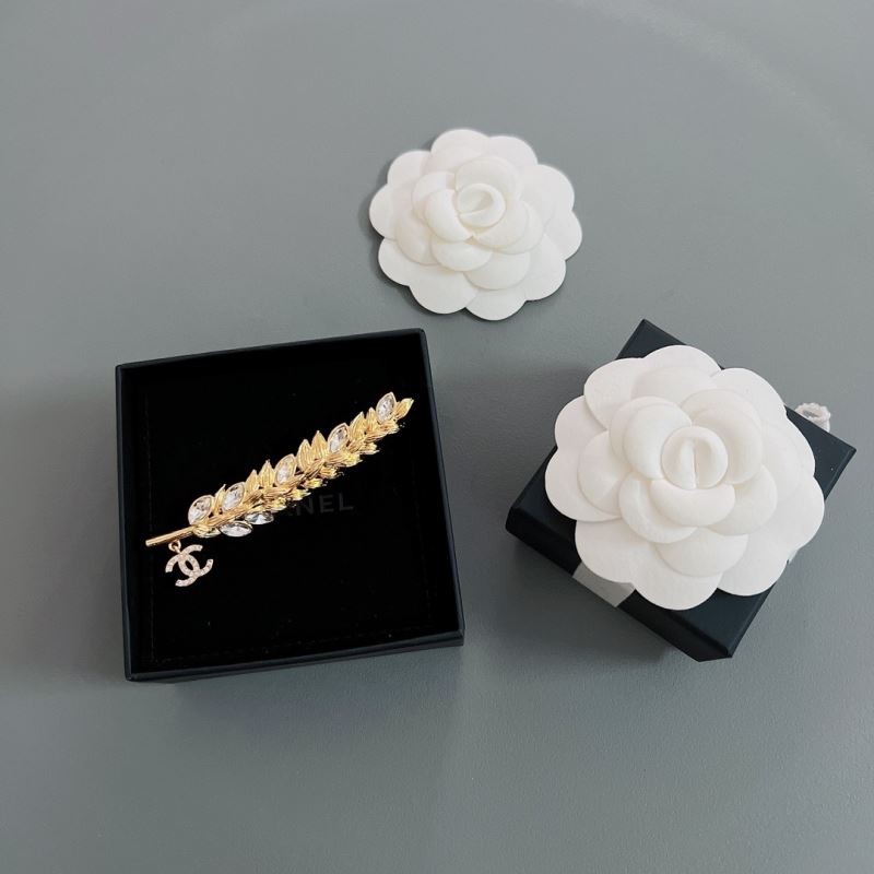 Ch*el brooches